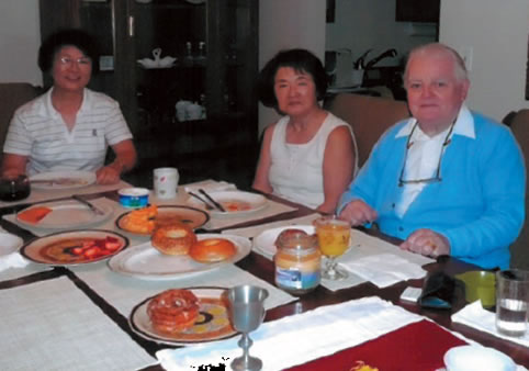 Theresa (center), her sister Agnes (left) and Fr. Sean Dunne