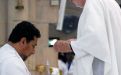 Fr. David Arms during the laying of hands